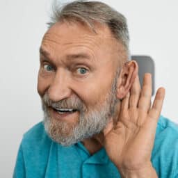 Man with hearing problems in hearing clinic