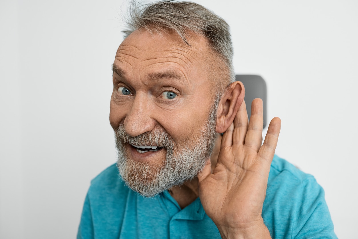 Man with hearing problems in hearing clinic
